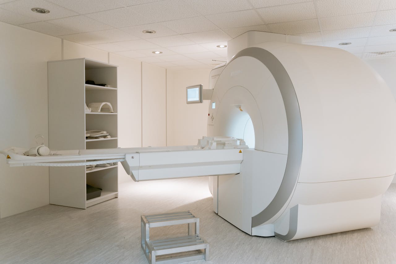 Interior view of a modern MRI scanner room, showcasing advanced medical imaging equipment.